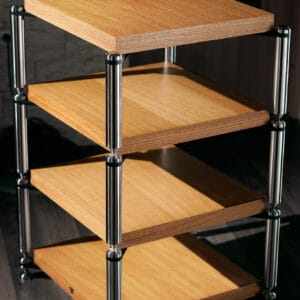 Sleek wooden shelving unit with metal supports for modern interior decor.