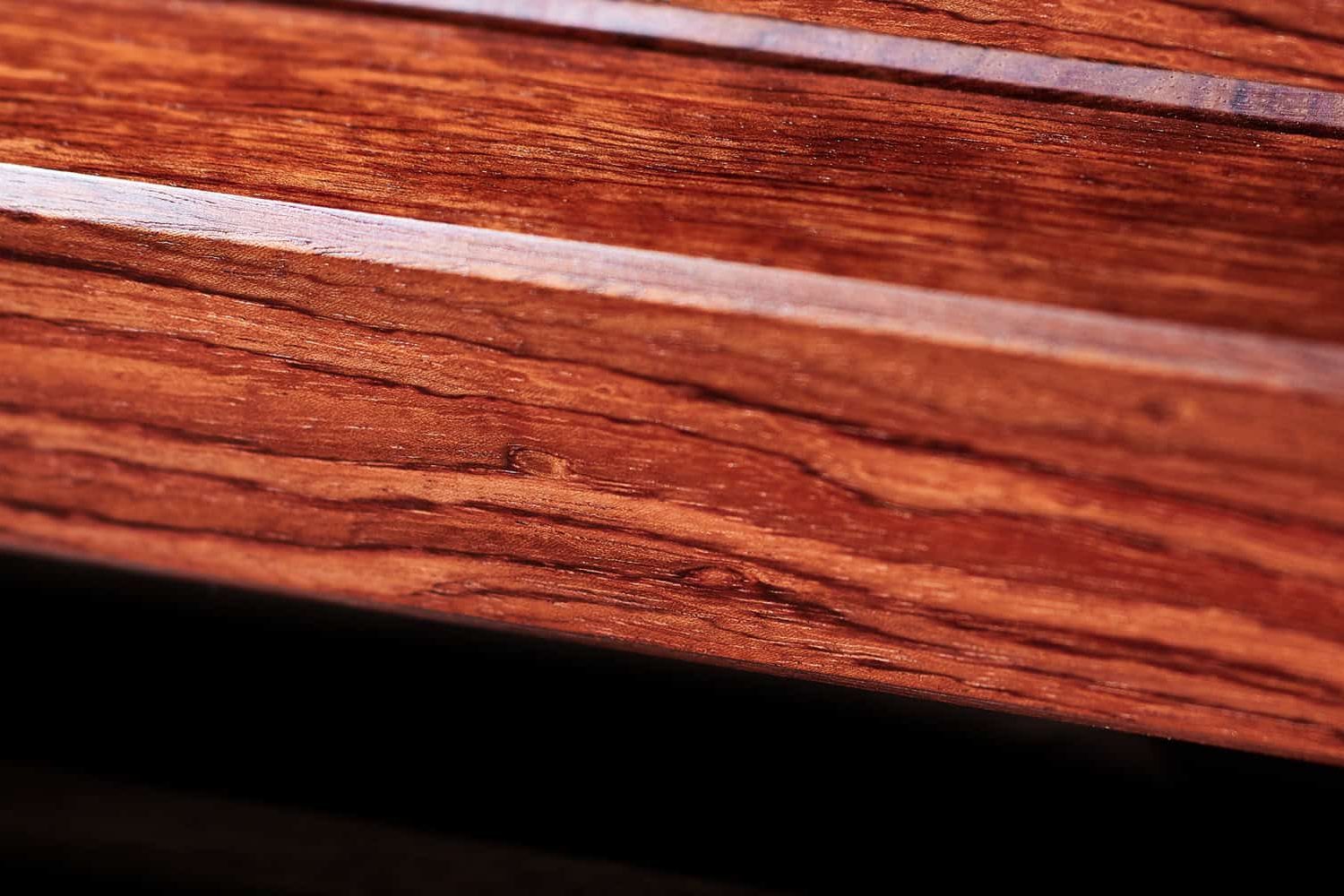 Rich, reddish hardwood wood texture perfect for furniture and flooring.